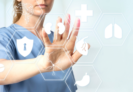 A female doctor with smart glasses touching a virtual screen.