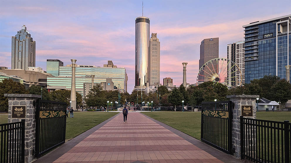 A panorama of the Olympic Park with the Atlanta skyline in the background.