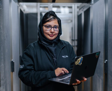 Picture of PhD student Ayesha Afzal in the server room.