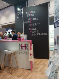 The inviting NHR Alliance booth at the ISC25 exhibition. (Image: J. Carl, NHR@FAU)