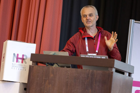 NHR@FAU's Jan Eitzinger from Software and Tools speaking at the NHR Conference, Image: NHR Alliance